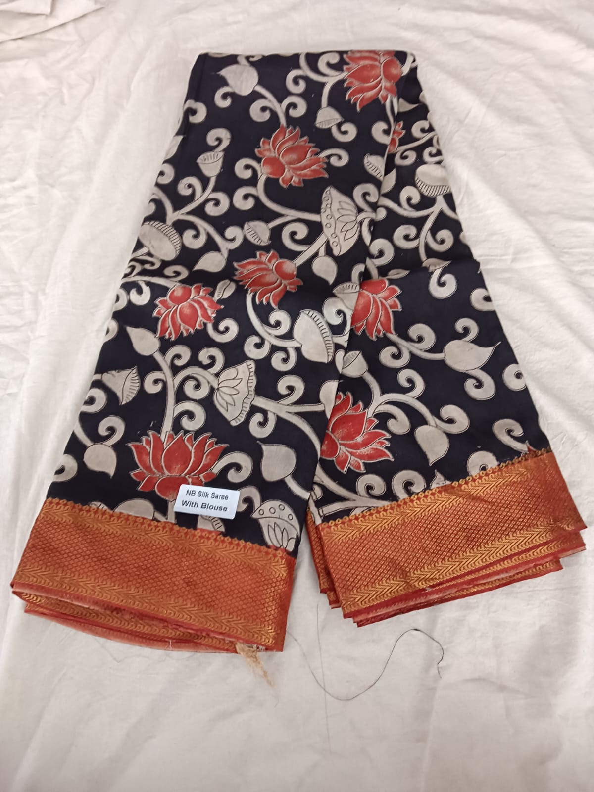 Black Silk Saree – Red Lotus Pattern with Zari Border