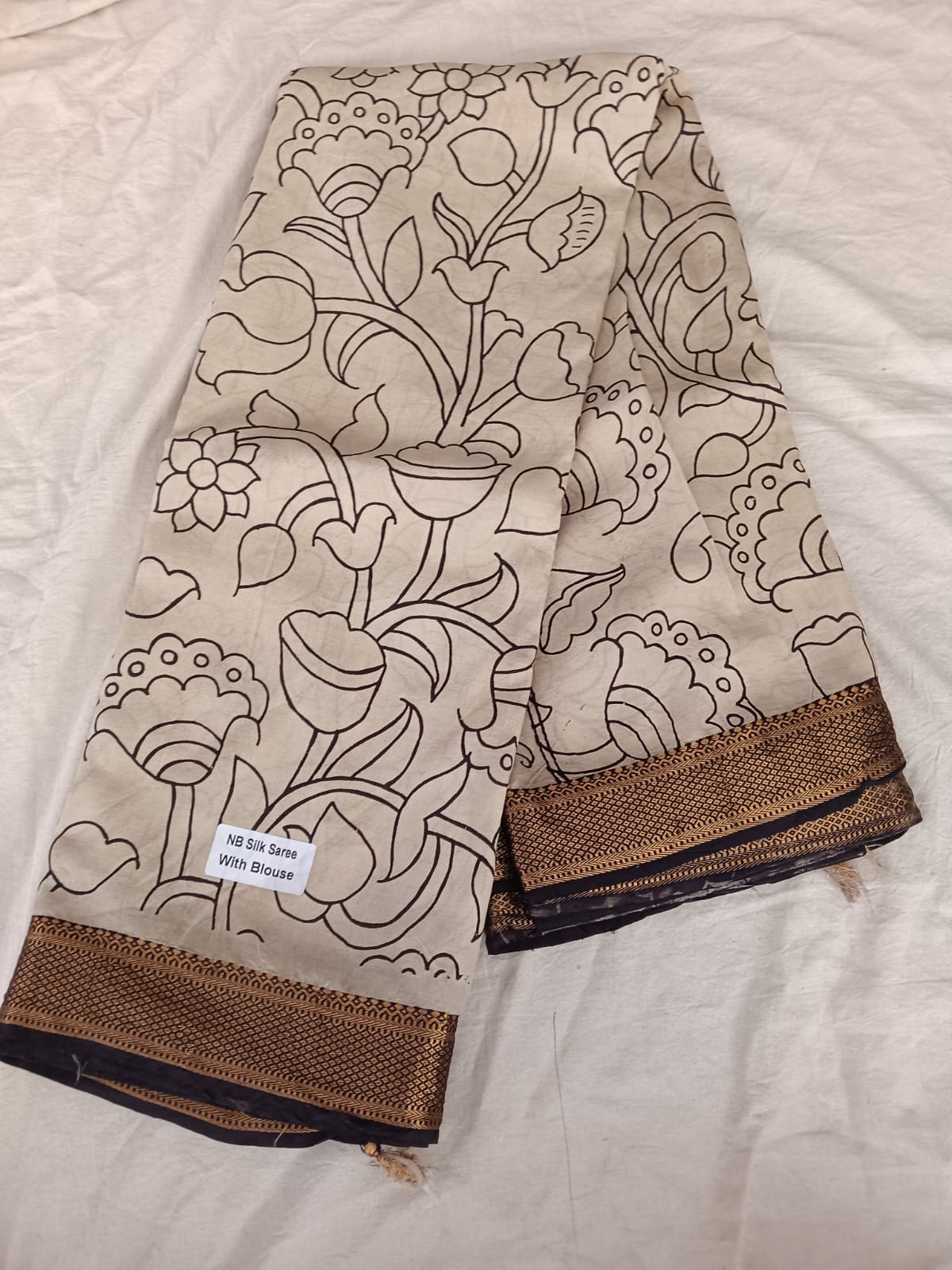 Classic Beige Silk Saree – Black Outline Floral & Zari Work
