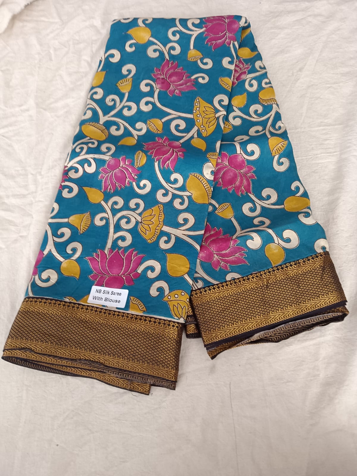 Elegant Blue NB Silk Saree – Lotus Motifs & Zari Finish