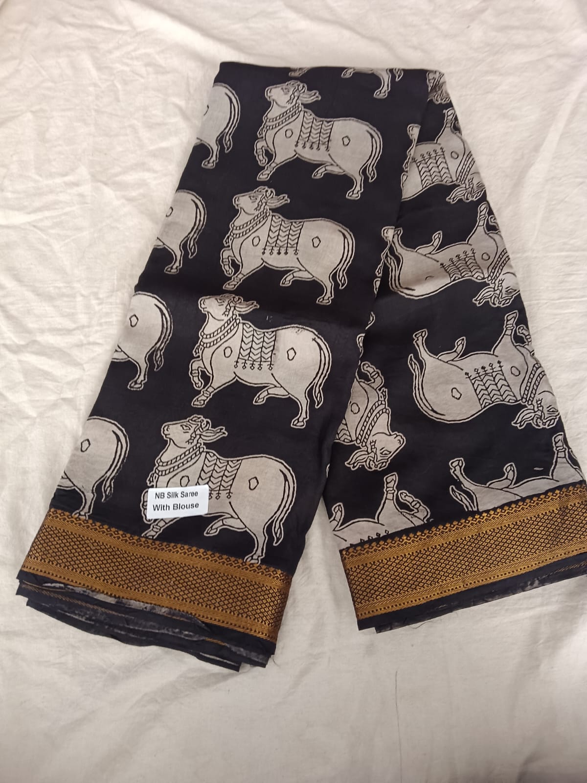 Nandi Design on Black Silk with Golden Border