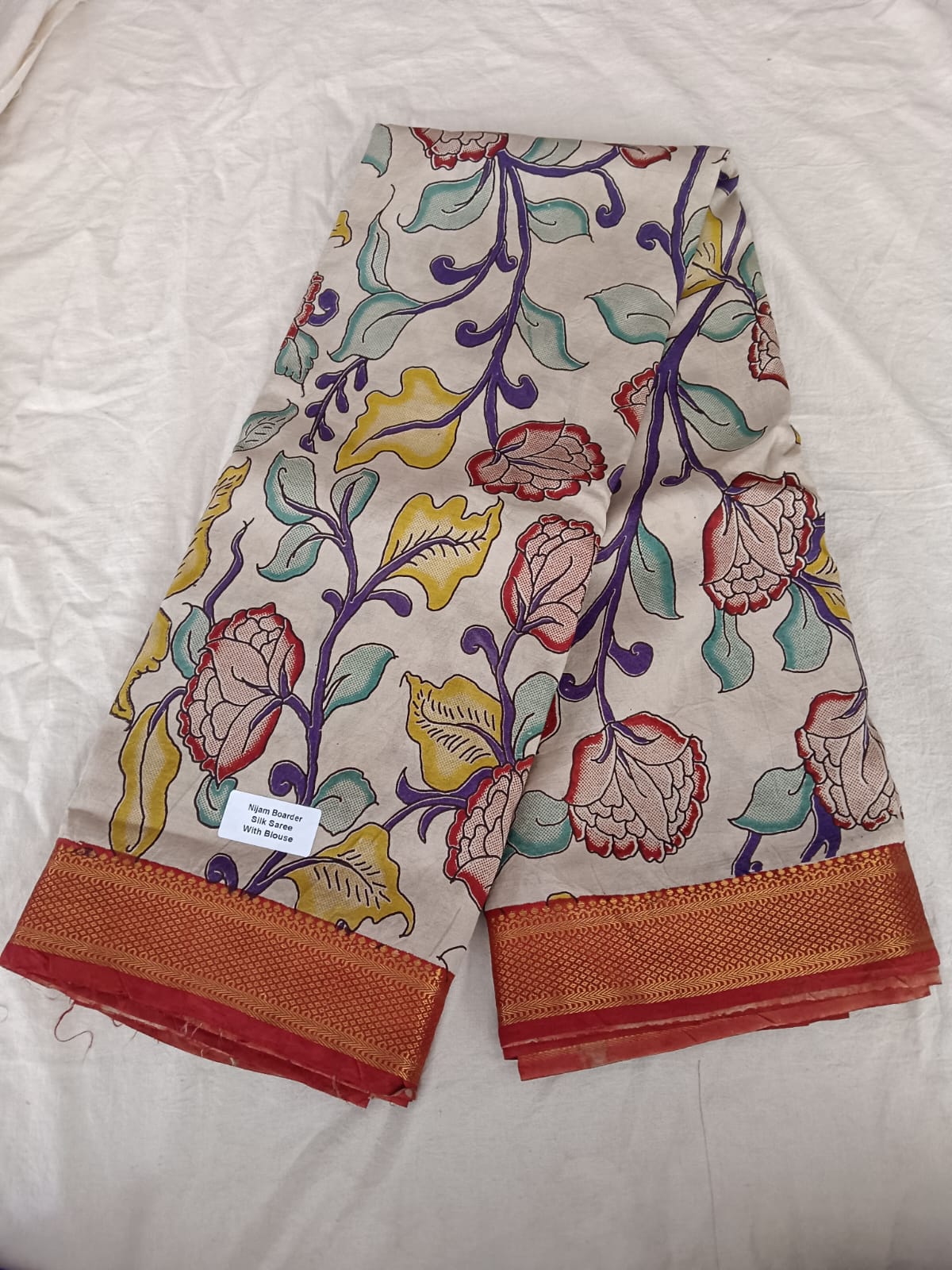 Nizam Border Silk Saree – Floral Kalamkari Print 